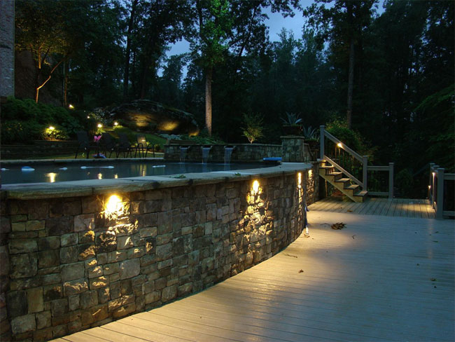 a home with outdoor lighting